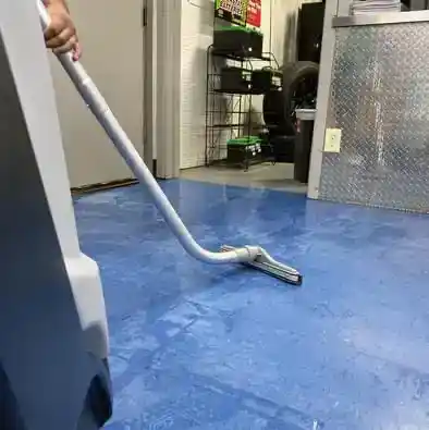 Floor scrubbing machine in action (deep cleaning)