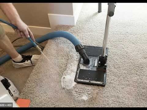 Professional carpet odor removal in a Yakima home using deep carpet cleaning equipment