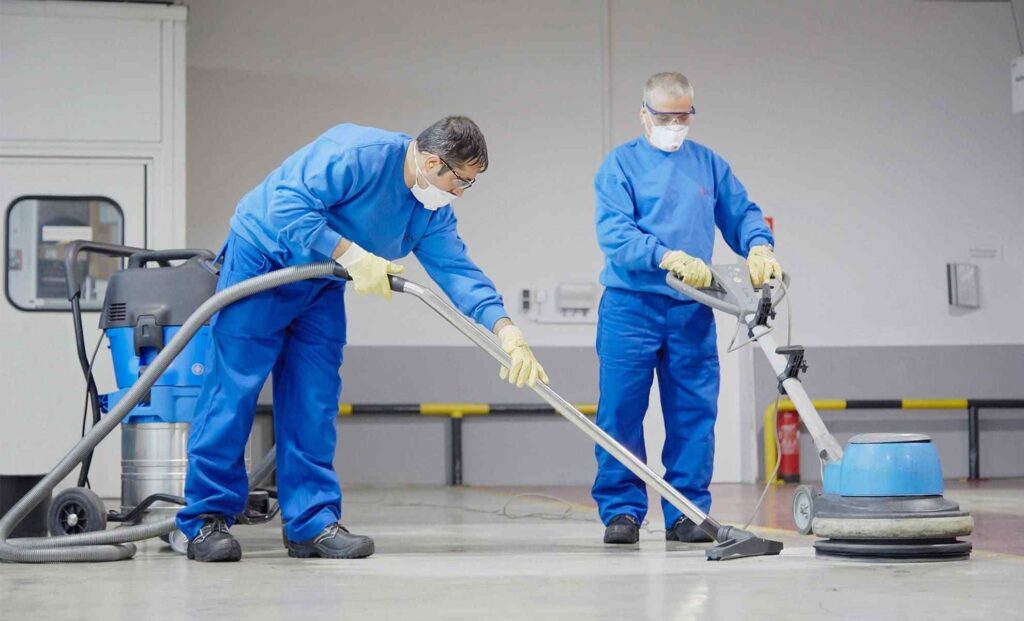 Local cleaning technician operating specialized floor cleaning equipment on a residential floor